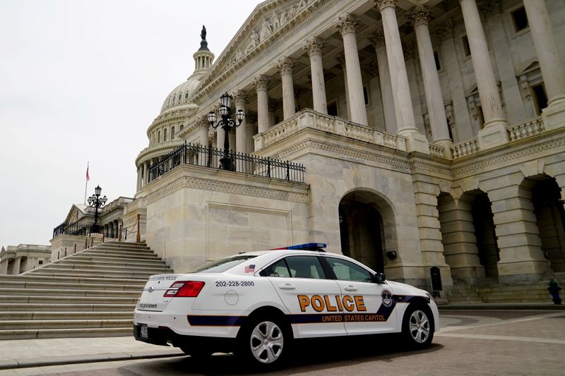 &copy; Reuters. FILE PHOTO: A Capitol Police vehicle parks at the U.S. Capitol in Washington, U.S., May 22, 2021. REUTERS/Erin Scott/File Photo