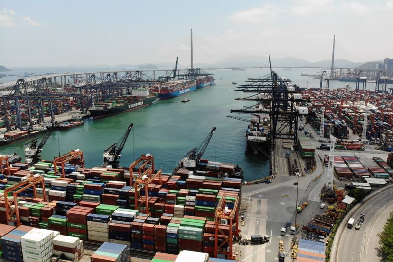 &copy; Reuters. FILE PHOTO: An aerial view shows containers and ships at the Kwai Chung Container Terminal in Hong Kong, China June 7, 2021. Picture taken June 7, 2021 with a drone. REUTERS/Aleksander Solum