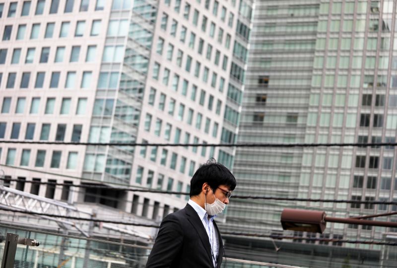 &copy; Reuters. Homem usa máscara em Tóquio
 30/7/2020  REUTERS/Issei Kato