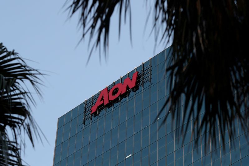 &copy; Reuters. FILE PHOTO: An office building with the Aon logo is seen amid the easing of the coronavirus disease (COVID-19) restrictions in the Central Business District of Sydney, Australia, June 3, 2020. REUTERS/Loren Elliott/File Photo