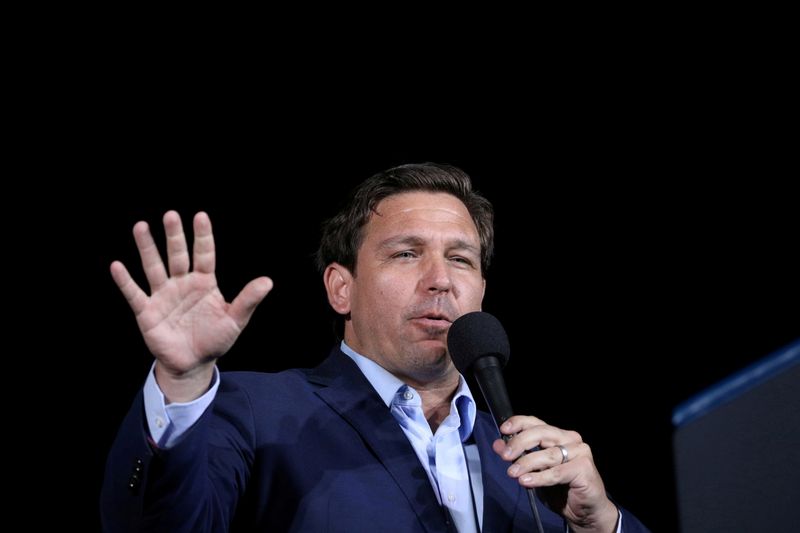 &copy; Reuters. FILE PHOTO: Florida Governor Ron Desantis speaks during a campaign rally by U.S. President Donald Trump at Pensacola International Airport in Pensacola, Florida, U.S., October 23, 2020. REUTERS/Tom Brenner/File Photo/File Photo