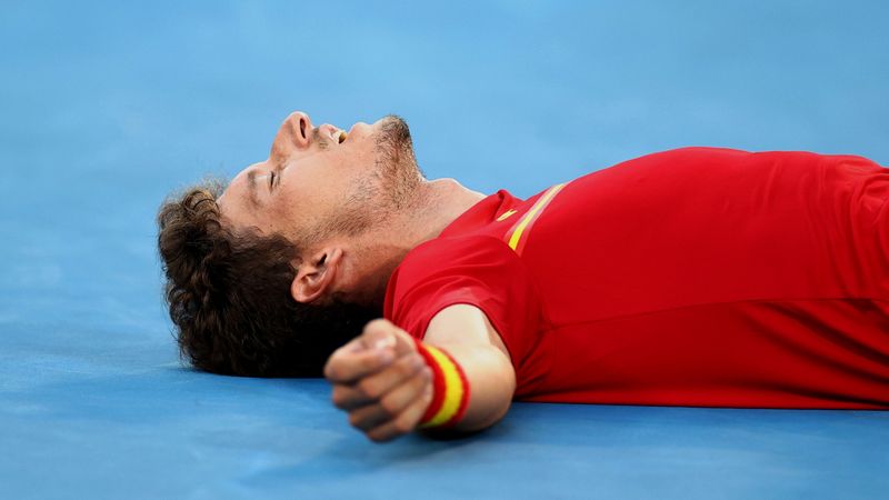 &copy; Reuters. Jul 31, 2021. 
Foto del sábado del tenista español Pablo Carreño Busta celebrando tras ganar la medalla de bronce en los Juegos de Tokio. 
REUTERS/Edgar Su