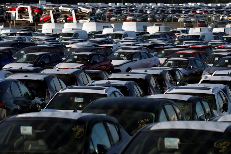 &copy; Reuters. FILE PHOTO: Stocks of new cars are parked in a lot, at Walon France automobile transport company in Hordain, northern France, May 26, 2020. REUTERS/Pascal Rossignol