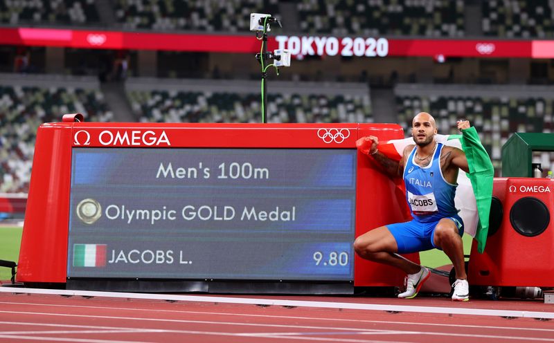 &copy; Reuters. Ago  1, 2021. 
Foto del domingo del italiano Lamont Marcell Jacobs celebrando tras ganar el oro en los 100 mts planos de los Juegos de Tokio. 
REUTERS/Lucy Nicholson