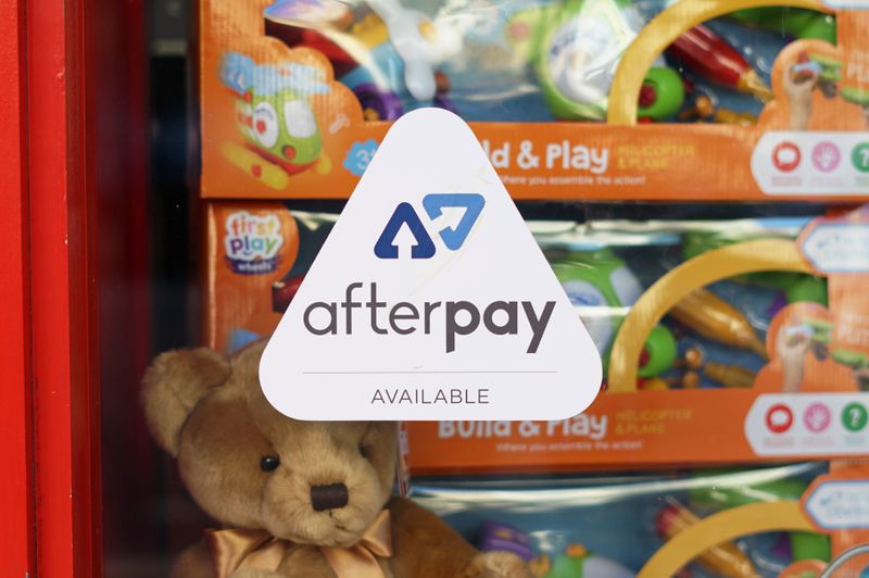 &copy; Reuters. FILE PHOTO: A logo for the company Afterpay is seen in a store window in Sydney, Australia, July 9, 2020.  REUTERS/Stephen Coates