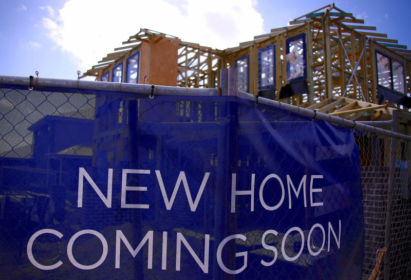 &copy; Reuters. FILE PHOTO: A house under construction can be seen behind an advertising banner at a housing development located in the western Sydney suburb of Oran Park in Australia, October 21, 2017. REUTERS/David Gray