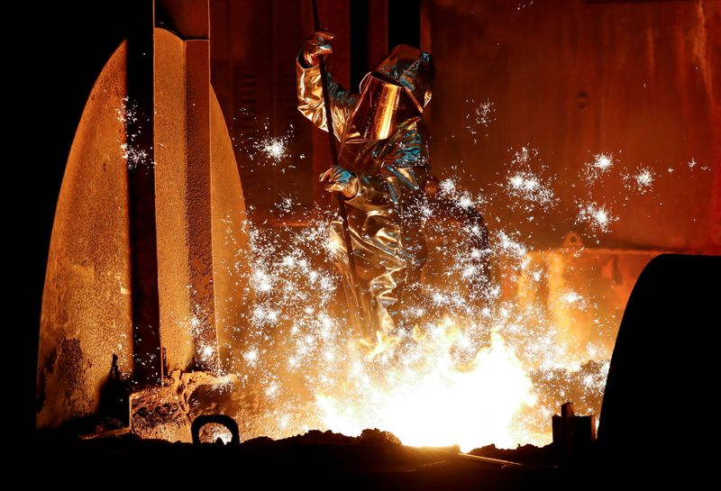 © Reuters. FILE PHOTO: A steel worker of Germany's industrial conglomerate ThyssenKrupp AG which holds its annual shareholders meeting on Friday February 1, 2019, takes a sample of raw iron from a blast furnace at Germany's largest steel factory in Duisburg, Germany, January 28, 2019. REUTERS/Wolfgang Rattay/File Photo