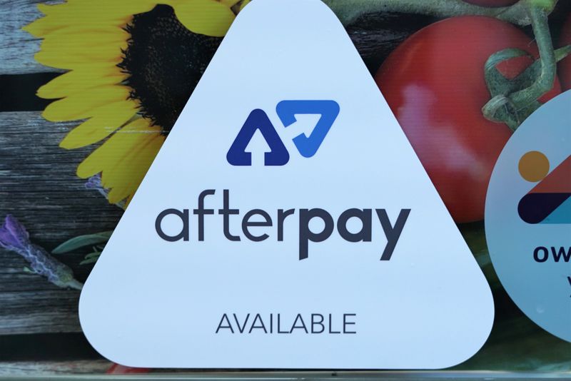 &copy; Reuters. A logo for the company Afterpay is seen in a store window in Sydney, Australia, July 9, 2020.  REUTERS/Stephen Coates