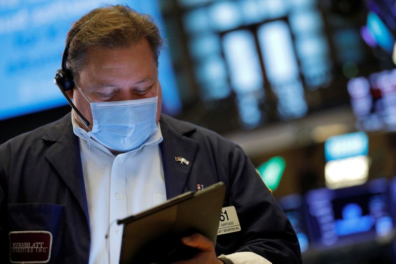 &copy; Reuters. A trader works on the floor of the New York Stock Exchange (NYSE) in New York City, New York, U.S., July 28, 2021. REUTERS/Andrew Kelly