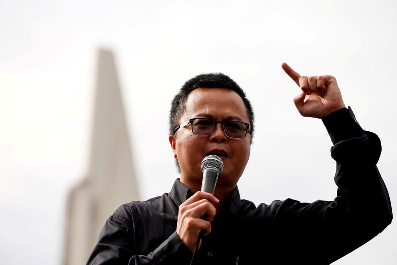 &copy; Reuters. FILE PHOTO: Human rights lawyer Arnon Nampa speaks during a Thai anti-government mass protest, on the 47th anniversary of the 1973 student uprising, in front of the Democracy monument, in Bangkok, Thailand October 14, 2020. REUTERS/Soe Zeya Tun/File Photo