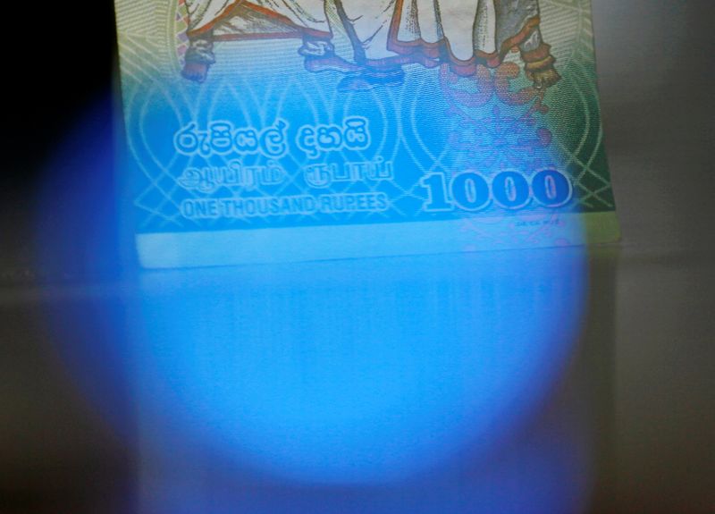 &copy; Reuters. A Sri Lankan Thousand rupee note is seen in this picture illustration taken September 26, 2018. REUTERS/Dinuka Liyanawatte/Illustration