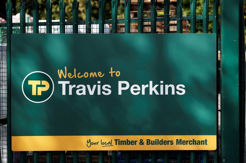 &copy; Reuters. A signage is pictured at Travis Perkins, a timber and building merchants yard in St Albans, Britain October 22, 2020. REUTERS/Paul Childs/File Photo