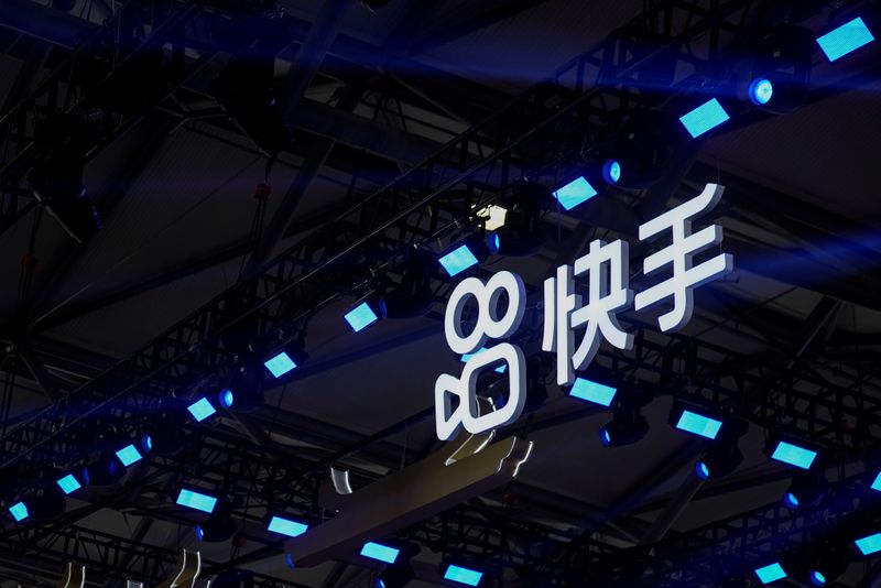 &copy; Reuters. FILE PHOTO: The logo of online video service operator Kuaishou Technology is seen at the China Digital Entertainment Expo and Conference, also known as ChinaJoy, in Shanghai, China July 30, 2021. Picture taken July 30, 2021. REUTERS/Aly Song