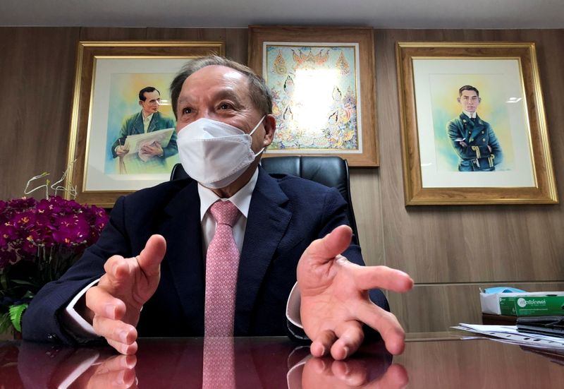 &copy; Reuters. FILE PHOTO: Chairman of Thonburi Healthcare Group, Boon Vanasin, speaks during an interview with Reuters at his office in Bangkok, Thailand, July 6, 2021. REUTERS/Artorn Pookasook