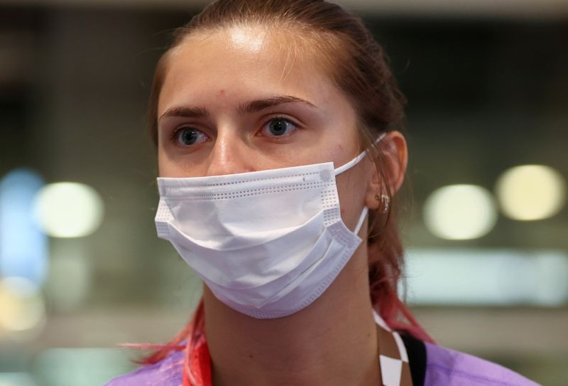 &copy; Reuters. Belarusian athlete Krystsina Tsimanouskaya is seen at Haneda international airport in Tokyo, Japan August 1, 2021.  REUTERS/Issei Kato
