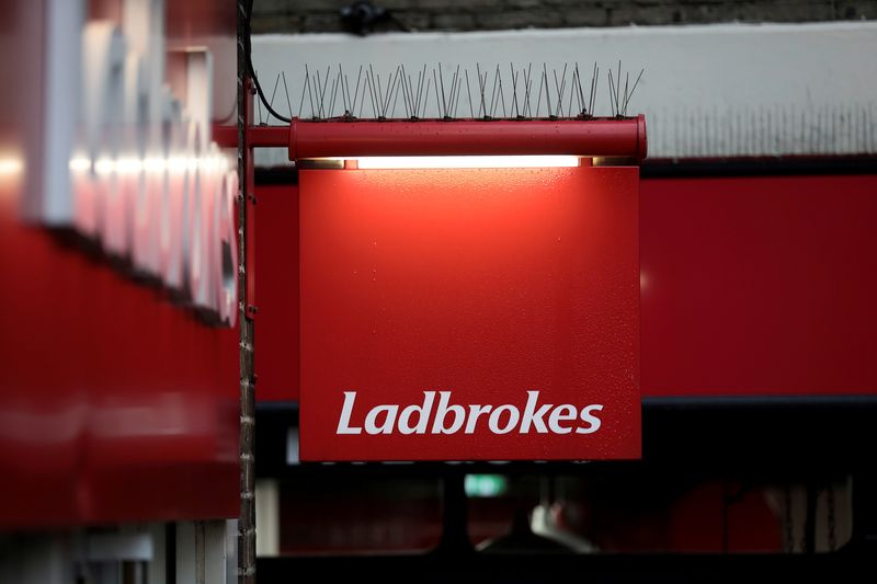 &copy; Reuters. FILE PHOTO: A sign hangs outside a branch of Ladbrokes in London, Britain December 22, 2017. REUTERS/Simon Dawson/File Photo