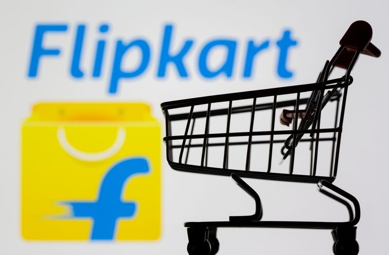 &copy; Reuters. FILE PHOTO: Small toy shopping cart is seen in front of displayed Flipkart logo in this illustration taken, July 30, 2021. REUTERS/Dado Ruvic/Illustration/File Photo