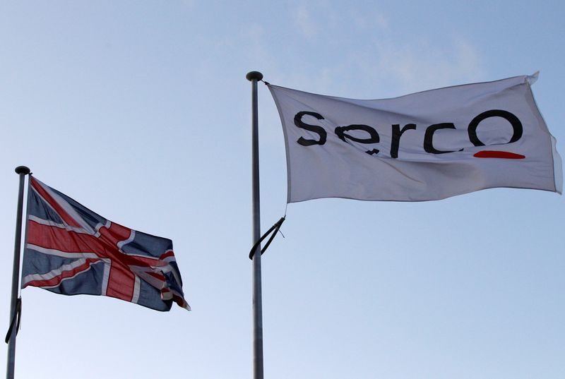 &copy; Reuters. FILE PHOTO: A Serco flag flies alongside a Union flag outside Doncaster Prison in northern England on December 13, 2011. REUTERS/Darren Staples