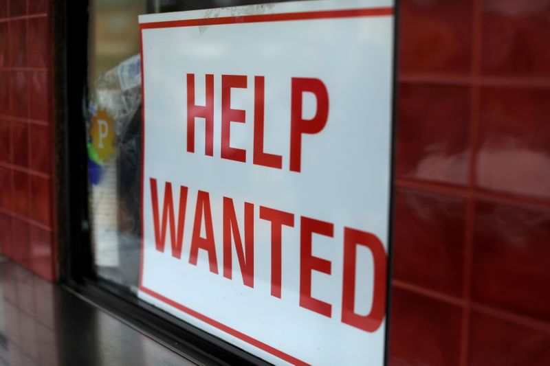 &copy; Reuters. FILE PHOTO: A help wanted sign is posted at a taco stand in Solana Beach, California, U.S., July 17, 2017. REUTERS/Mike Blake