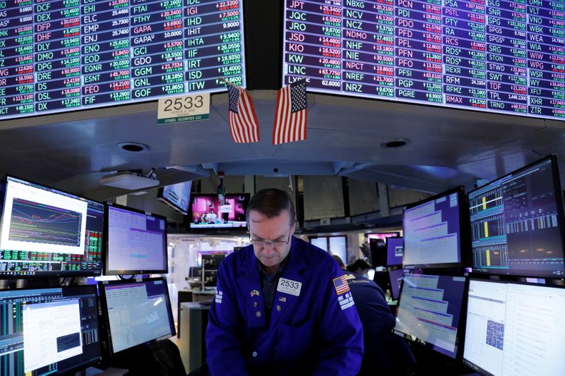 &copy; Reuters. A trader works on the trading floor at the New York Stock Exchange (NYSE) in Manhattan, New York City, U.S., August 5, 2021. REUTERS/Andrew Kelly