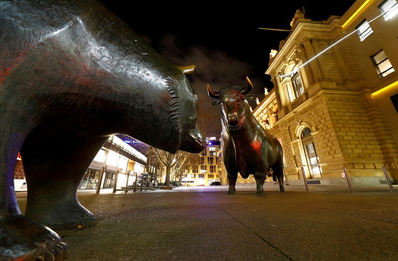 &copy; Reuters. FILE PHOTO: Bull and bear symbols are seen in front of the German stock exchange (Deutsche Boerse) in Frankfurt, Germany, February 12, 2019.  REUTERS/Kai Pfaffenbach//File Photo
