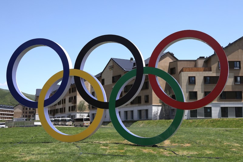 &copy; Reuters. FILE PHOTO: A giant monument of Olympic Rings is seen at the Zhangjiakou Olympic and Paralympic village for the Beijing 2022 Winter Olympic Games during an organised media tour in Zhangjiakou, Hebei province, China July 14, 2021. Picture taken July 14, 20