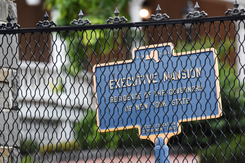 &copy; Reuters. A sign is pictured through the fence at the Governor's Mansion, after an independent inquiry showed that Governor Andrew Cuomo sexually harassed multiple women and violated federal and state laws, in Albany, New York, U.S., August 7, 2021. REUTERS/Cindy S