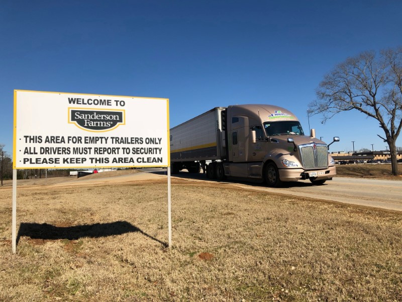 &copy; Reuters. FILE PHOTO: A truck laden with chicken leg quarters leaves Sanderson Farms poultry processing plant enroute to Mexico, in Palestine, Texas, U.S., January 17, 2018.  Photo taken January 17, 2018.  REUTERS/Jason Lange