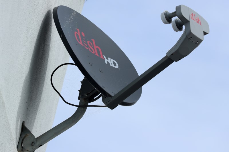 &copy; Reuters. FILE PHOTO: A Dish Network satellite dish is shown on a residential home in Encinitas, California, U.S., November 8, 2017. REUTERS/Mike Blake