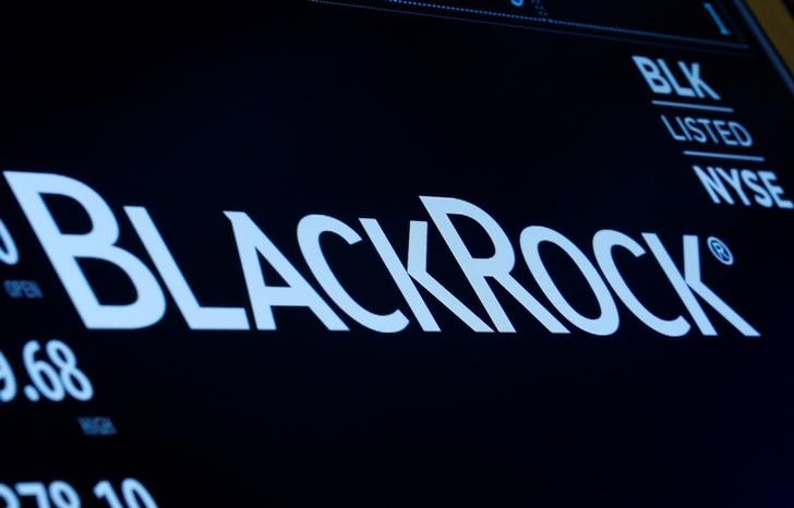 &copy; Reuters. The company logo and trading information for BlackRock is displayed on a screen on the floor of the New York Stock Exchange (NYSE) in New York, U.S., March 30, 2017. REUTERS/Brendan McDermid