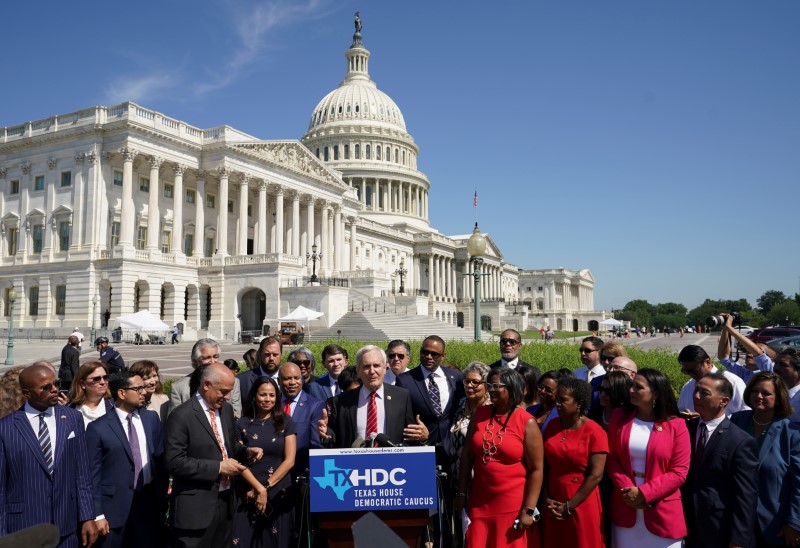 © Reuters. FILE PHOTO: Congressman Lloyd Doggett (D-TX) joins other Democratic members of the Texas House of Representatives, who are boycotting a special session of the legislature in an effort to block Republican-backed voting restrictions, as they speak in front of the U.S. Capitol in Washington, U.S., July 13, 2021. REUTERS/Kevin Lamarque