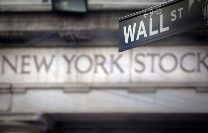 &copy; Reuters. La Bourse de New York a fini en ordre dispersé mardi. L'indice Dow Jones a gagné 0,46%. /Photo d'archives/REUTERS/Carlo Allegri
