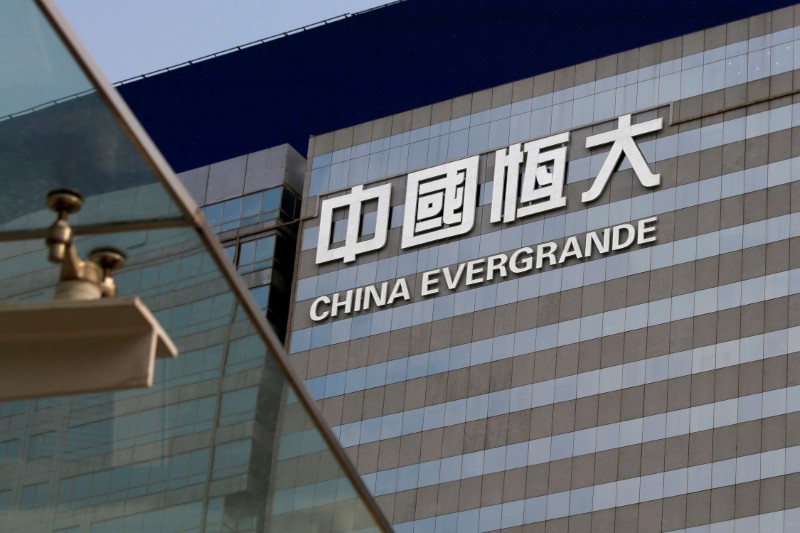 Debt-laden Evergrande says in sale talks for certain assets; shares jump
