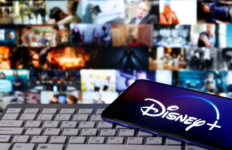 &copy; Reuters. FILE PHOTO: A smartphone with displayed "Disney" logo is seen on the keyboard in this illustration taken March 24, 2020. REUTERS/Dado Ruvic