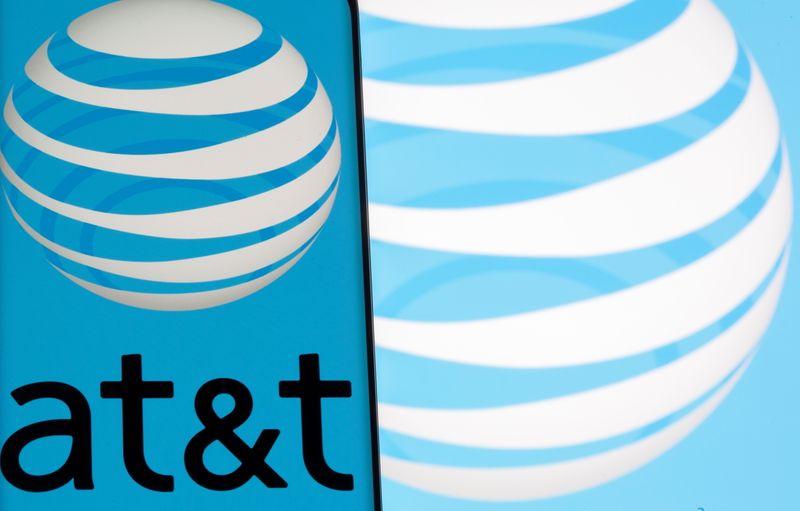 &copy; Reuters. AT&T logo is seen on a smartphone in front of displayed same logo in this illustration taken May 17, 2021. REUTERS/Dado Ruvic/Files