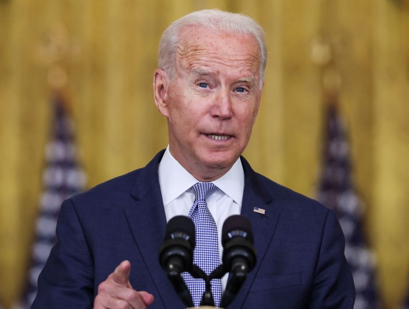 Biden adds forces for Afghan evacuation, defends withdrawal decision
