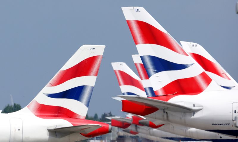 &copy; Reuters. FILE PHOTO: British Airways tail fins are pictured at Heathrow Airport in London, Britain, May 17, 2021. REUTERS/John Sibley//File Photo