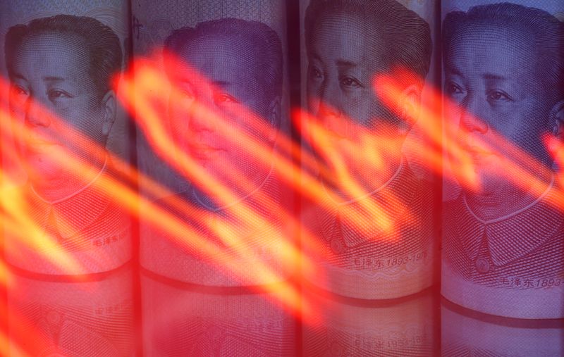 &copy; Reuters. FILE PHOTO: Chinese Yuan banknotes are seen behind illuminated stock graph in this illustration taken February 10, 2020. REUTERS/Dado Ruvic/Illustration/File Photo