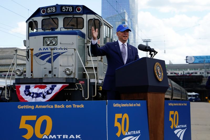 U.S. Democrats ride trains, buses to spotlight spending push