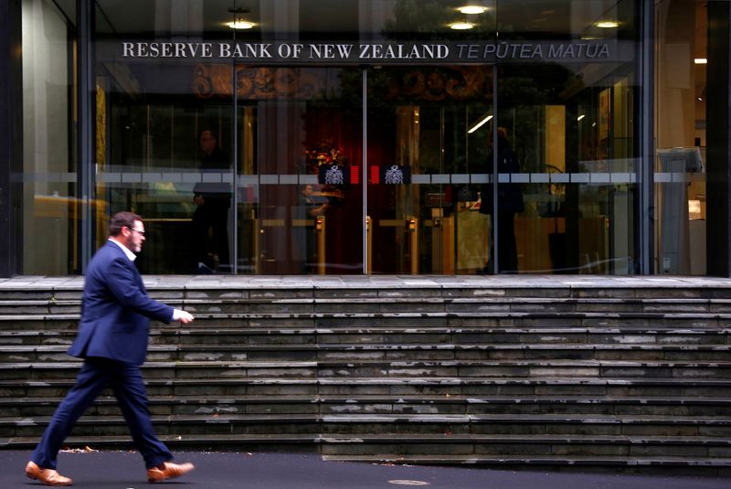 &copy; Reuters. A pedestrian walks past the main entrance to the Reserve Bank of New Zealand located in central Wellington, New Zealand, July 3, 2017.  REUTERS/David Gray