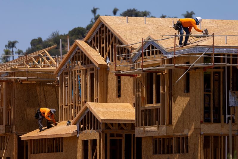 &copy; Reuters. FILE PHOTO: Residential single family homes construction by KB Home are shown under construction in the community of Valley Center, California, U.S. June 3, 2021.   REUTERS/Mike Blake