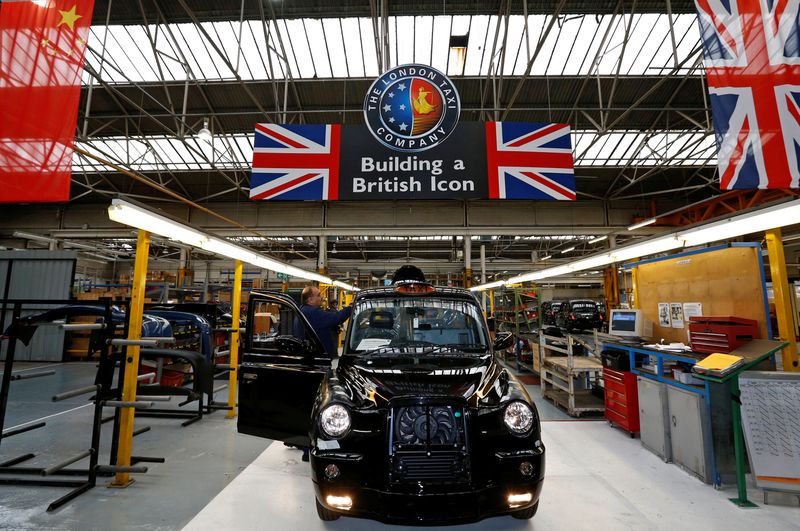 &copy; Reuters. A worker checks a TX4 at the end of the production line at the London Taxi Company in Coventry, central England, September 11, 2013. REUTERS/Darren Staples/Files