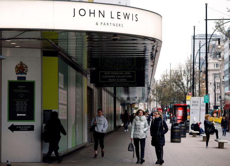 &copy; Reuters. People walk past a temporarily closed John Lewis department store on Oxford Street in London, Britain, March 24, 2021. REUTERS/John Sibley