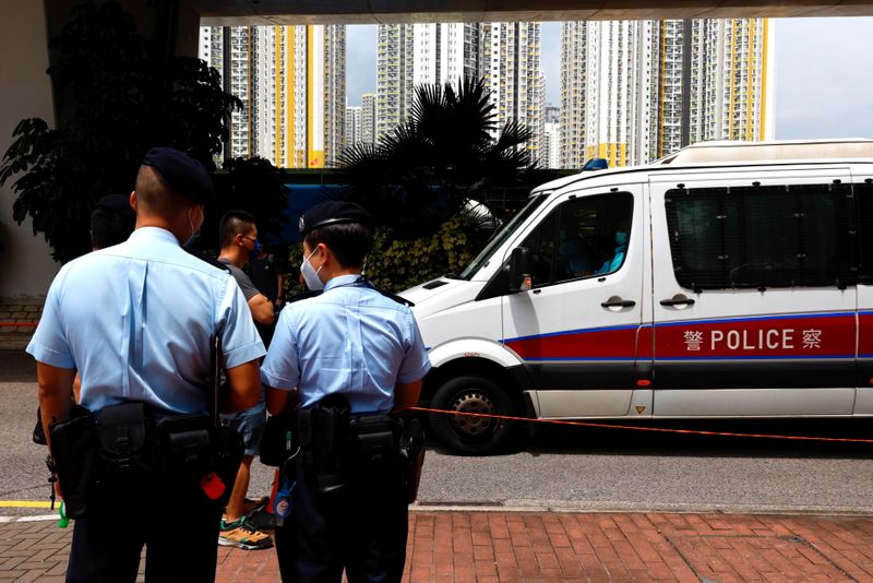 &copy; Reuters. A police van carries a member of Hong Kong University Student Union to West Kowloon Magistrates' Courts building over national security law in Hong Kong, China August 19, 2021. REUTERS/Tyrone Siu