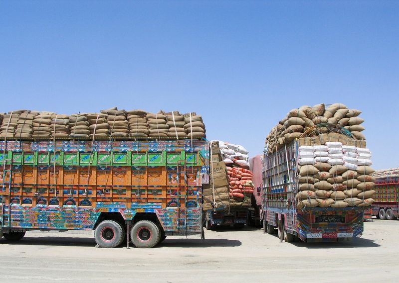 &copy; Reuters. Trucks loaded with supplies wait to cross into Afghanistan at the Friendship Gate crossing point, in the Pakistan-Afghanistan border town of Chaman, Pakistan August 19, 2021. REUTERS/Saeed Ali Achakzai