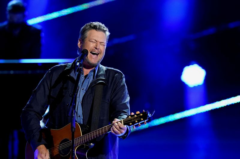 &copy; Reuters. FILE PHOTO: Blake Shelton performs at the Grand Ole Opry in Nashville, Tennessee, U.S., April 17, 2021, for a taped appearance on the 56th Academy of Country Music Awards show to be aired on April 18, 2021. REUTERS/Harrison McClary