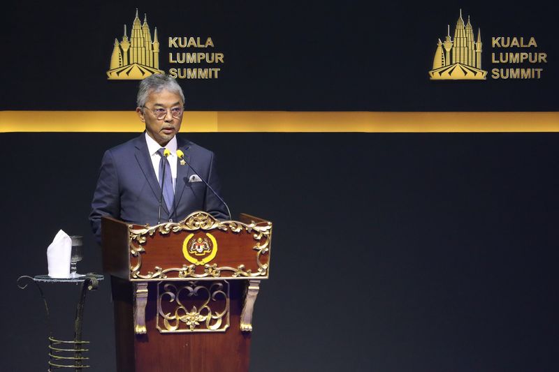 Malaysia's new prime minister brings graft-tainted party back to power