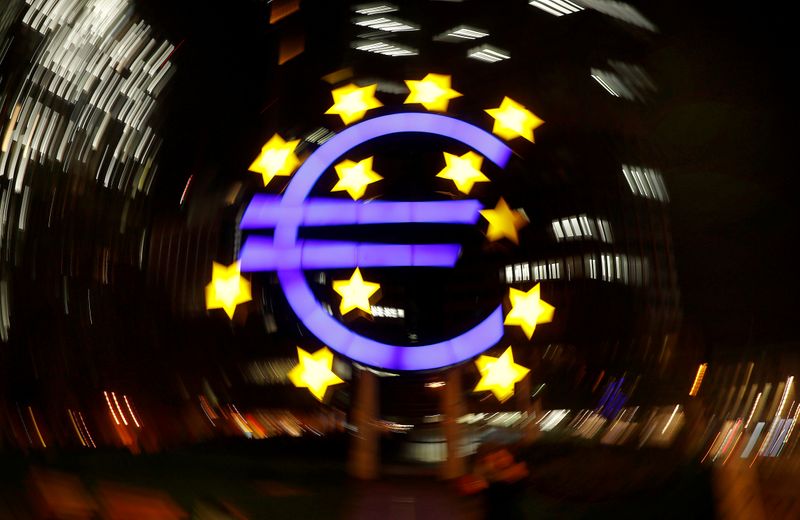 &copy; Reuters. FILE PHOTO: The euro sign is photographed in front of the former head quarter of the European Central Bank in Frankfurt, Germany, April 9, 2019. Picture is taken on slow shutter speed while the camera was moved.  REUTERS/Kai Pfaffenbach/File Photo