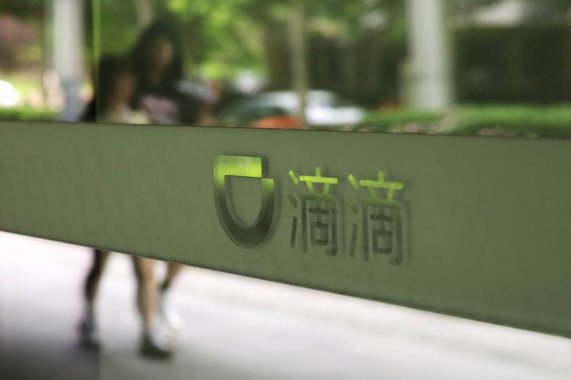 &copy; Reuters. A sign of Chinese ride-hailing service Didi is seen at its headquarters in Beijing, China July 5, 2021. REUTERS/Tingshu Wang