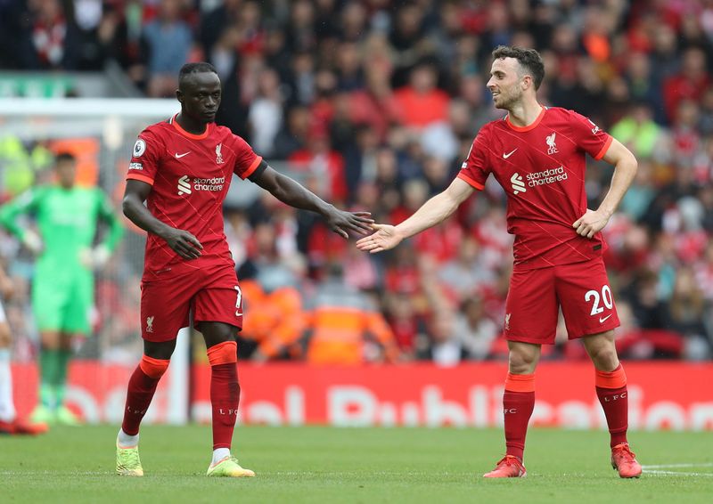 &copy; Reuters. Soccer Football - Premier League - Liverpool v Burnley - Anfield, Liverpool, Britain - August 21, 2021 Liverpool's Sadio Mane celebrates scoring their second goal with Diogo Jota REUTERS/Russell Cheyne 